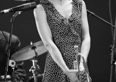 Andrea Motis on stage with trumpet
